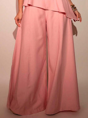 Conjunto Feminino Rosa com Calça Pantalona e Blusa Tomara que Caia Peplum Assimétrico em Tecido Marrant Elegante