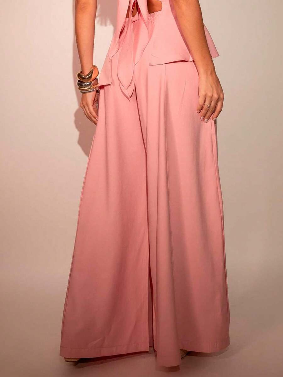 Conjunto Feminino Rosa com Calça Pantalona e Blusa Tomara que Caia Peplum Assimétrico em Tecido Marrant Elegante